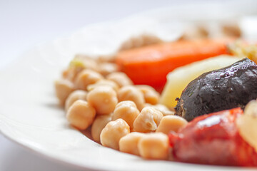 Madrid typical stew whit chickpea black pudding carrot and potatoes