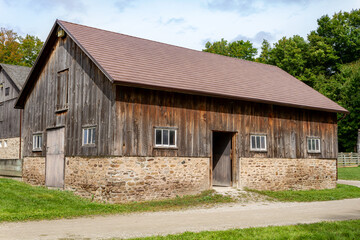 Fototapeta na wymiar Exterior of an old wooden barn in Ontario farmland