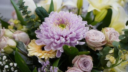 Bouquet of aster with roses and gerbera