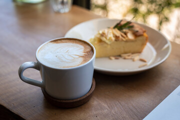 Coffee cup with Apple pie cake with on wooden table