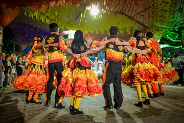 Fotobehang Muziekwinkel Traditional quadrilha dance in the street during the June festivities in Bananeiras, Paraiba, Brazil on June 23, 2015. 