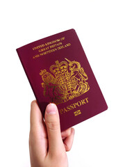 A Woman holding a British National Oversea (BNO) Passport 