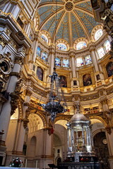 Fototapeta na wymiar View of the dome Of the Cathedral of the Incarnation with its delicate stained glass windows in Granada, Spain