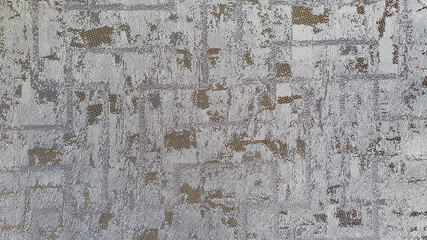 close up of grey and golden fabric background. abstract grunge luxury fabric textre. 