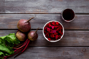 Beet - slices, fresh juice, green tops - from above