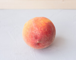 peach on a wooden table