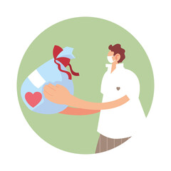 man with mask and box donations