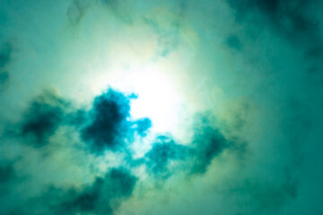 Fototapeta na wymiar Colored image of a clouded sun