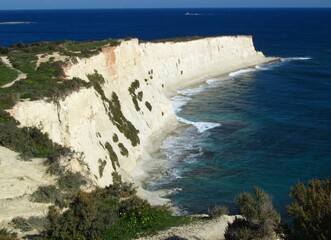 Aerial shot of beautiful Xrobb l-Ghagin cliffs in Marsaxlokk, Malta