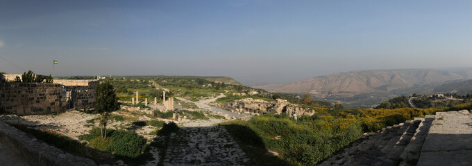 panorama of the ancient ruins in Umm Qais/ Jordan with Golan Heights in the background