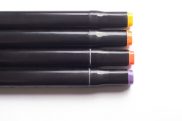 set of colored markers isolated on white background with copyspace