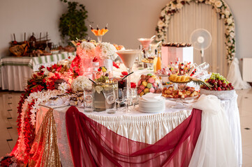 Sweet cakes at a wedding buffet. Catering