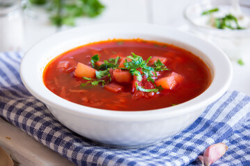 Vegetable soup borsch made with beetroot and other vegetables