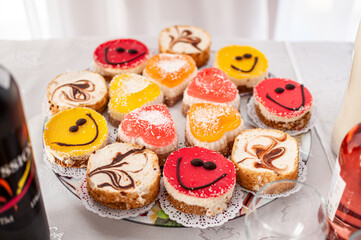 Sweet cakes at a wedding buffet. Catering
