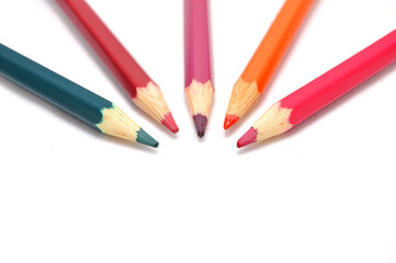 Pencils сolored on a white background close up. Drawing, art