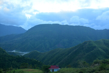 Fototapeta premium Treasure Mountain overview with house in Tanay, Rizal, Philippines