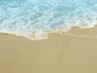 Plakat Beach sand with small ripples, vacation or travel concept background with space for text