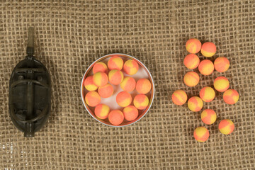 Boilies, fishing baits, close up, Fishing baits for carp. Baits for carp.Carp feeder. Carp fishing