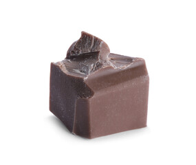 Piece of milk chocolate isolated on white