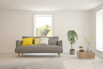 White living room with sofa and winter landscape in window. Scandinavian interior design. 3D illustration