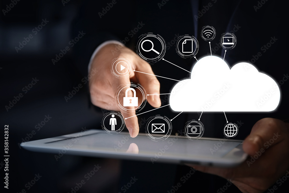 Poster cloud computing and storage concept. businessman using tablet on dark background, closeup