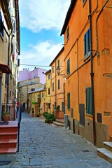 a glimpse of the characteristic medieval village of Castagneto Carducci in Tuscany Italy, where the poet Giosuè Carducci lived
