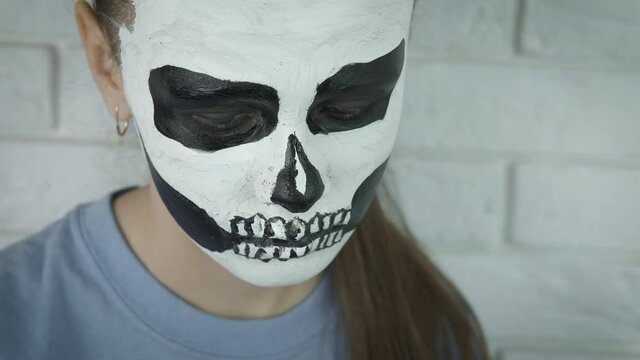 Death mask on the face.