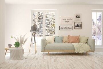White living room with sofa and winter landscape in window. Scandinavian interior design. 3D illustration