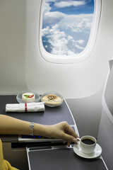 Food served on board of business class airplane on the table
