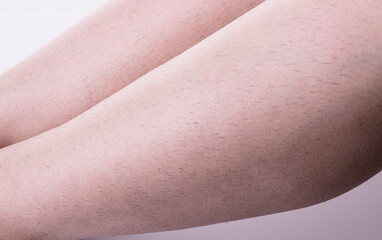 unshaven female legs close-up