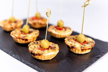 Tartelettes with pears, mushrooms and brie cheese 