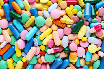 Fototapeta na wymiar Background of colorful medicine pills