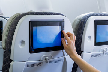 Traveling airplane and using touchscreen In-flight Entertainment