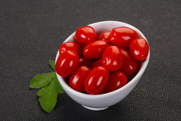 Red cherry tomatoes in the bowl