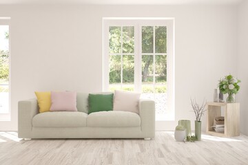 White living room with sofa and summer landscape in window. Scandinavian interior design. 3D illustration