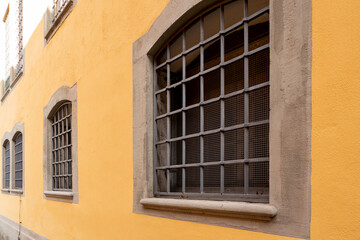 House facade with barred windows