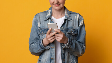 Modern Communication. Unrecognizable Middle Aged Woman Using Smartphone, Browsing New App