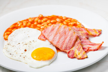 English breakfast with bacon beans and egg