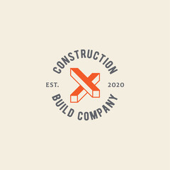 Building or construction logo. Emblem of a construction company. Building elements and letters arranged in a circle. Round emblem.