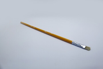 Brush refers to a tool consisting of bristles or threads attached to the end of a cable, a tool used to paint and clean