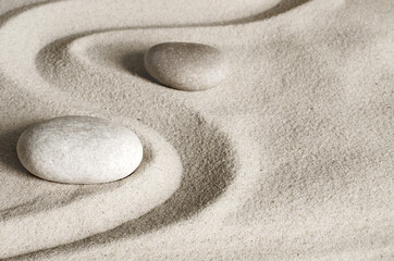 Fototapeta na wymiar Japanese zen garden meditation stone, concentration and relaxation sand for harmony and balance