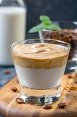 Cold milk with whipped coffee foam.