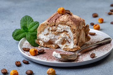 Piece of meringue coffee roulade.