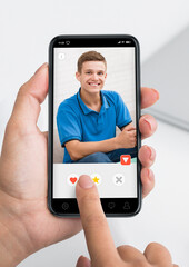 Woman using cell phone with male profile on the display