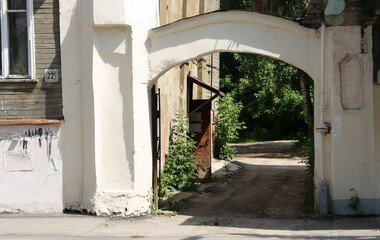 Old arch in the courtyard of an old house