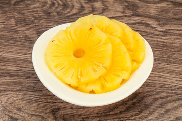 Marinated pineapple rings in the bowl