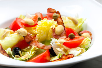 vegetable salad with bacon and capers