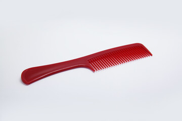 Plastic comb suitable for short and long haircuts, designed not to scratch the scalp or damage hair