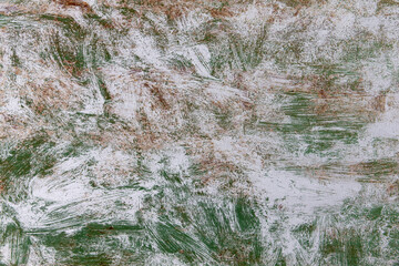 Textured green and white painted rusty messy aged weathered background.