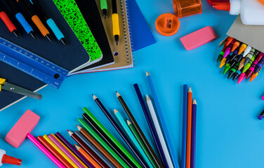 School supplies, notebooks, colored pencils, scissors